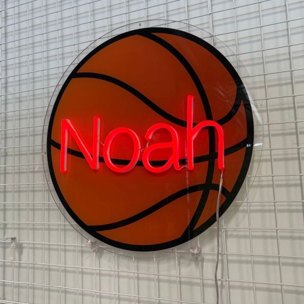 Personalized LED neon name sign with a basketball background from Custom Neon®