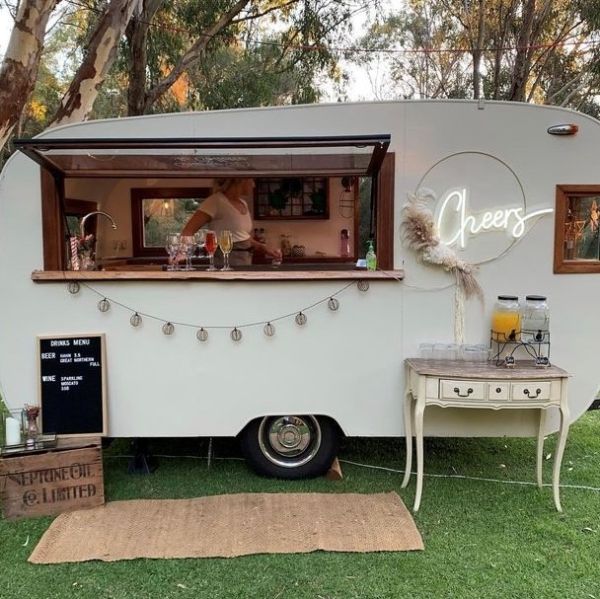 Cheers white CUSTOM NEON® sign on the @minteventscollective bar van