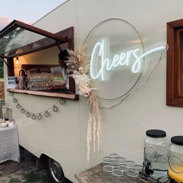 Cheers white LED neon sign by CUSTOM NEON® shown @minteventscollective bar van