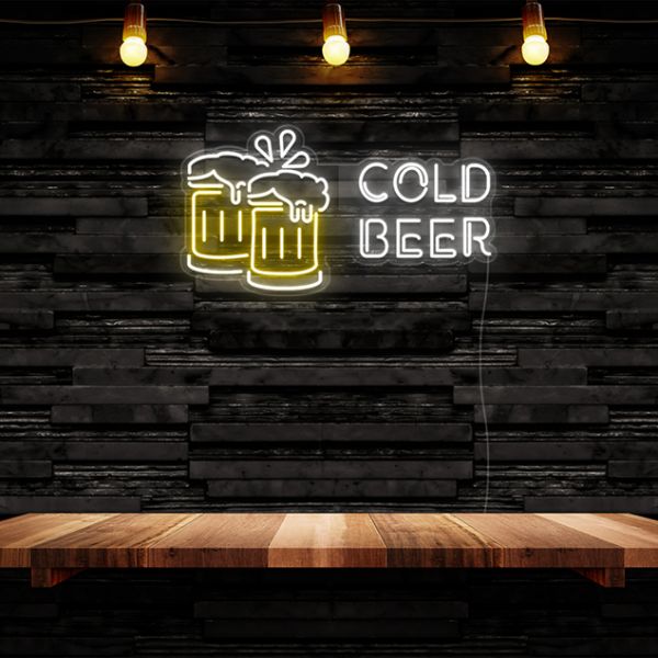 Cold Beer white & yellow Custom Neon® sign shown wall mounted in a bar.
