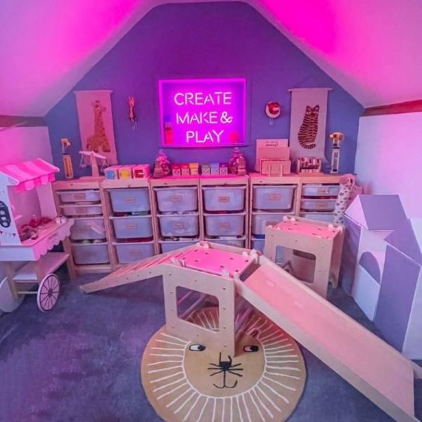 Create Make & Play Neon Sign shown in a kids play room @create_make_and_play