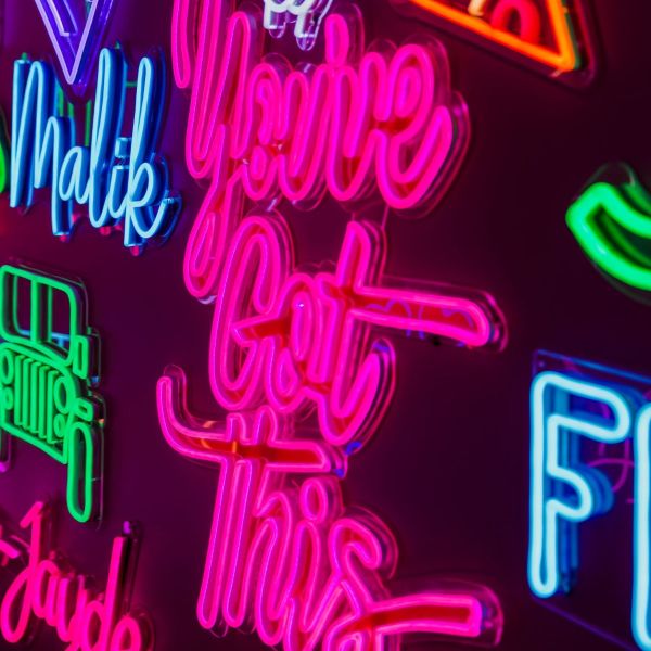 You've Got This pink LED neon sign with red UV print from Custom Neon® shown as wall art