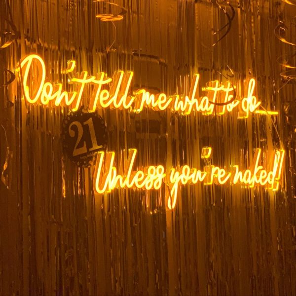 Don't Tell Me What to do Unless You're Naked orange light sign by Custom Neon®