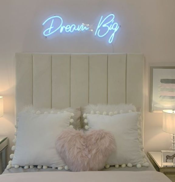 Dream Big CUSTOM NEON® Sign above a bed