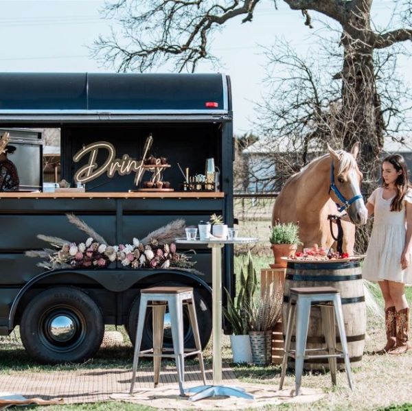 Drinks LED neon sign in warm white in a bar van in a rural setting @establishmentbrews photo by @janazerpoliphotography sign by @customneon