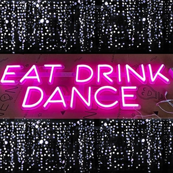EAT DRINK DANCE playful pink LED neon sign - photo from Custom Neon by Neon Collective