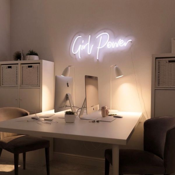 Custom Neon® white Girl Power sign wall mounted above a desk - styling @insidestudiocouk