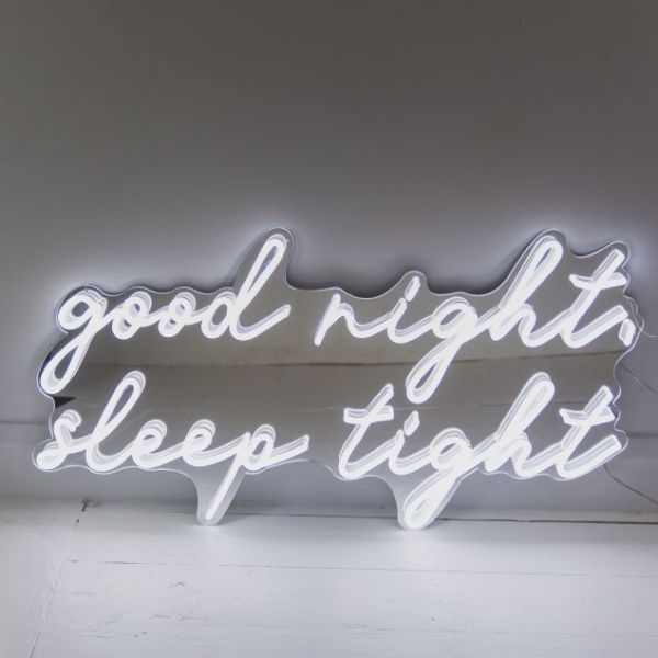Good Night Sleep Tight white LED on silver mirrored backing shown in dim light - CUSTOM NEON® 