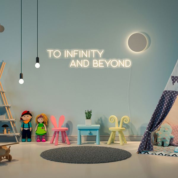 Infinity and Beyond White Neon Word Sign by CUSTOM NEON® shown in child's play room