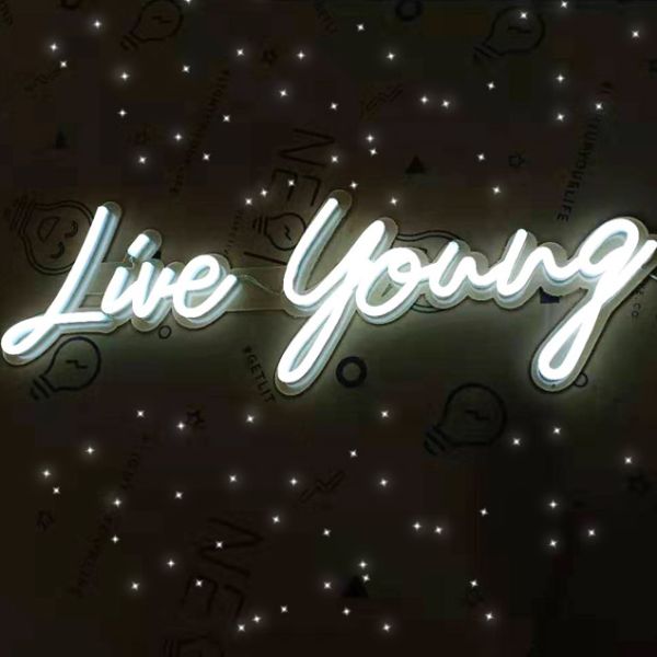 Live Young light up word sign in white LED neon - from Custom Neon®
