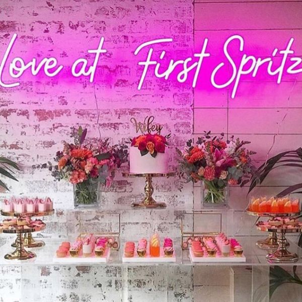 Love at First Spritz LED Neon sign shown at a wedding party - sign by CustomNeon.com.au