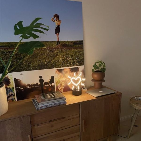 Love Sparks white mini LED light shown in a lounge room - made by @customneon