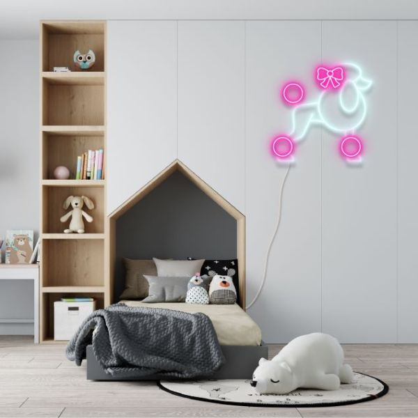 Neon poodle with bow in white and pink LED flex shown as bedroom wall art from CustomNeon.com.au