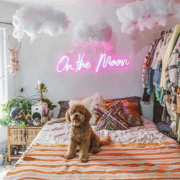 On the Moon pink light sign shown turned on - made by @customneon for @malloryonthemoon