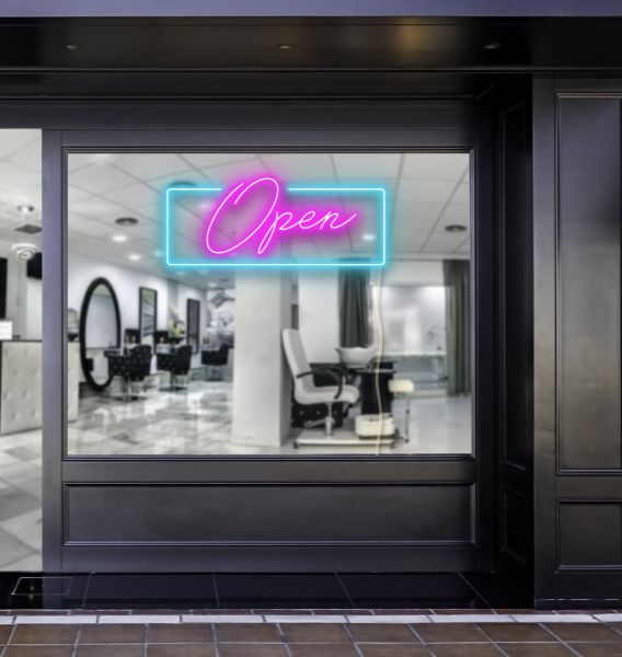 Pink LED neon open sign with a bright blue rectangular outline shown in a beauty salon window - photo CustomNeon.com.au