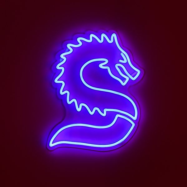 Stylized Chinese Dragon LED neon art from Custom Neon® shown illuminated in blue o a dark background