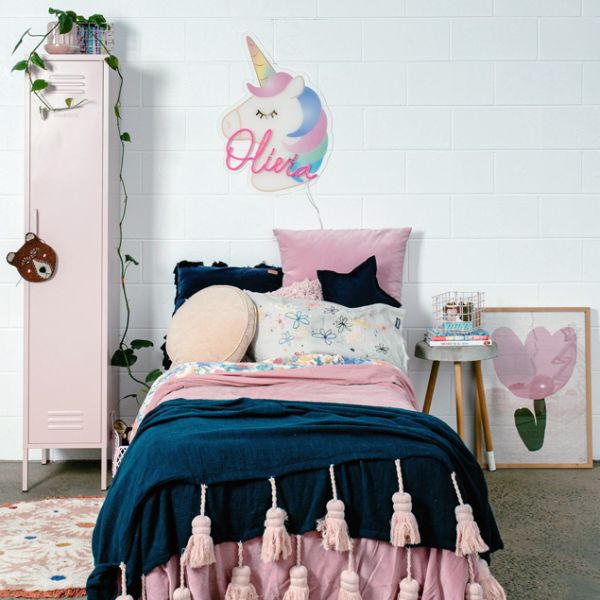 Personalized children's room name sign in neon flex with a unicorn background, shown with the LED turned off - from CustomNeon.com