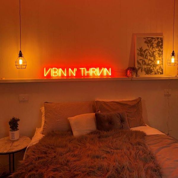 Vibin 'n Thrivin orange neon bedroom light - from Custom Neon