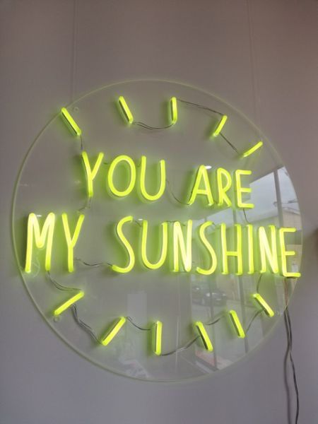 You Are My Sunshine LED neon sign in lemon yellow shown illuminated - from Custom Neon®