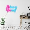 Be You / Believe in Yourself  CUSTOM NEON® sign in pink & blue wall mounted in a home office/study area