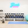 Beast Mode CUSTOM NEON® Sign in blue & pink on fitness studio wall