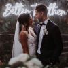Better Together LED neon wedding sign behind the happy couple - from Custom Neon