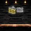 Cold Beer white & yellow Custom Neon® sign shown wall mounted in a bar.