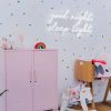 Good Night Sleep Tight white LED nightlight sign on silver mirrored backing wall mounted in a nursery by CUSTOM NEON® 