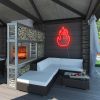 Custom Neon® Art: Flaming Fire in dark red wall mounted in the outdoor entertainment area
