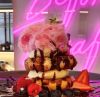 Waffles with Persian fairy floss in front of a pink Death Before Decaf sign @skullandrosecafe by Custom Neon