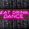 EAT DRINK DANCE playful pink LED neon sign - photo from Custom Neon by Neon Collective