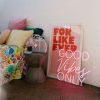 Good Vibes Only pink LED neon sign in a bedroom - from Custom Neon®