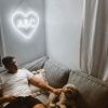 Heart personalized with initials hung in living room - from Custom Neon