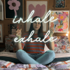 Custom Neon® Inhale Exhale sign shown in a bedroom