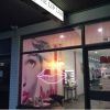 LED neon flex lips light shown in pink as a storefront window sign - from Custom Neon®