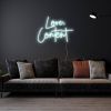 Love, Content white faux neon sign wall mounted above a sofa - design by Custom Neon