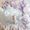 Oh Baby baby shower sign shown surrounded by balloons and cakes - photo from Custom Neon by Neon Collective