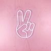 LED Neon Peace Emoji Sign Light shown on a pink wall - Photo CustomNeon.com.au