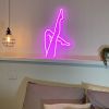 Sexy Legs LED neon sign above a bed - from Custom Neon®