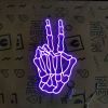 Purple skeleton hand peace art in LED neon flex by Custom Neon®