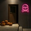 Skull & Bone pre-designed light-up wall art from Custom Neon® shown on dark wall in Halloween setting