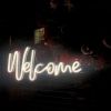 Welcome neon light shown at the entrance to an event - made by @customneon