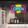 WE'RE OPEN 24/7 neon sign in yellow, blue & pink shown in a cafe window - from CustomNeon.com.au