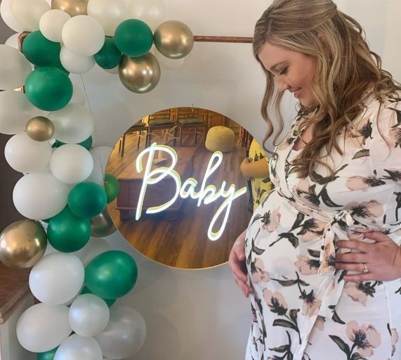 Custom Neon® gold backed white LED baby shower sign