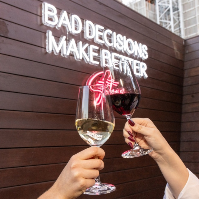 Multicoloured Custom Neon® outdoor restaurant selfie sign @stories.au