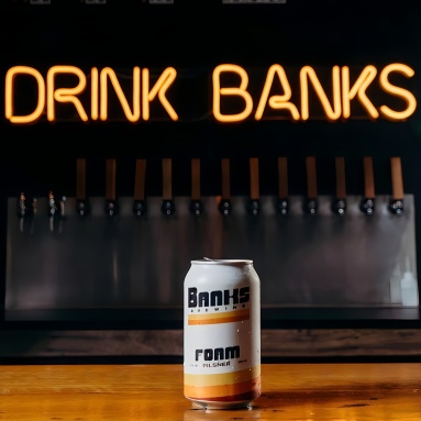 Custom Neon® orange Drink Banks branded tagline sign @banksbrewing