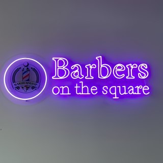 Purple barbershop logo sign by Custom Neon® @barbers.onthesquare