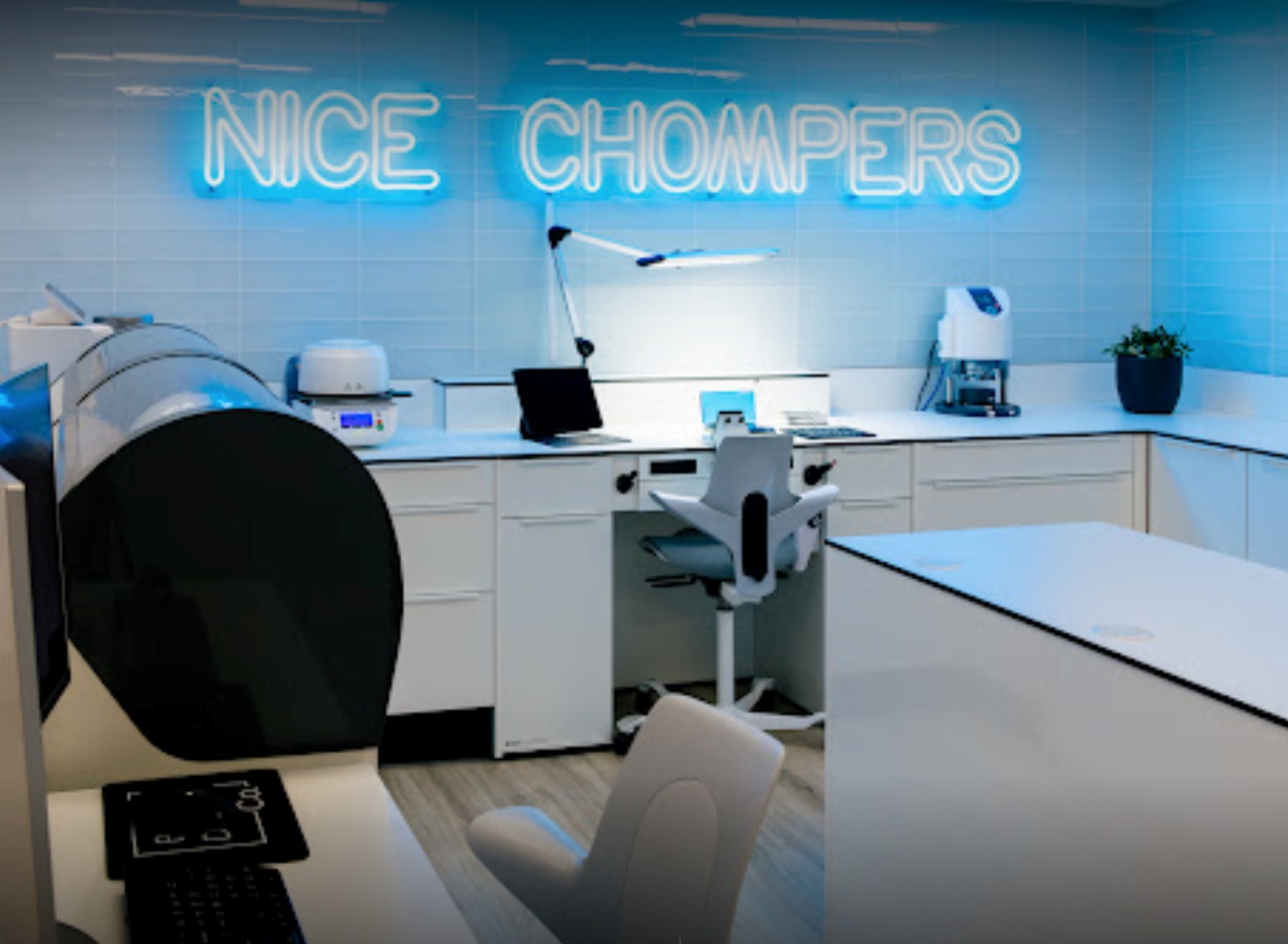 Custom Neon® Nice Chompers sign in the dental technician lab @bauerdentalcom
