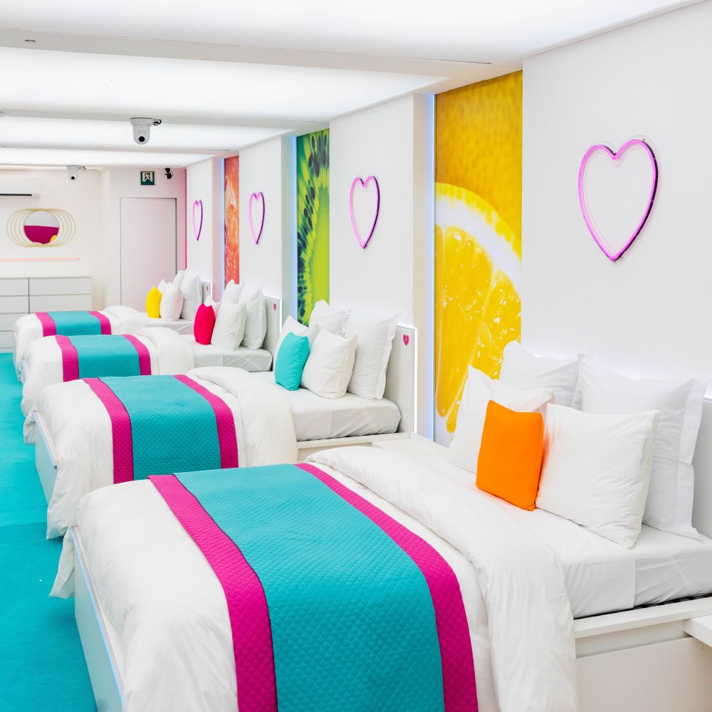 Custom Neon® hearts in the Love Island Australia Villa bedroom