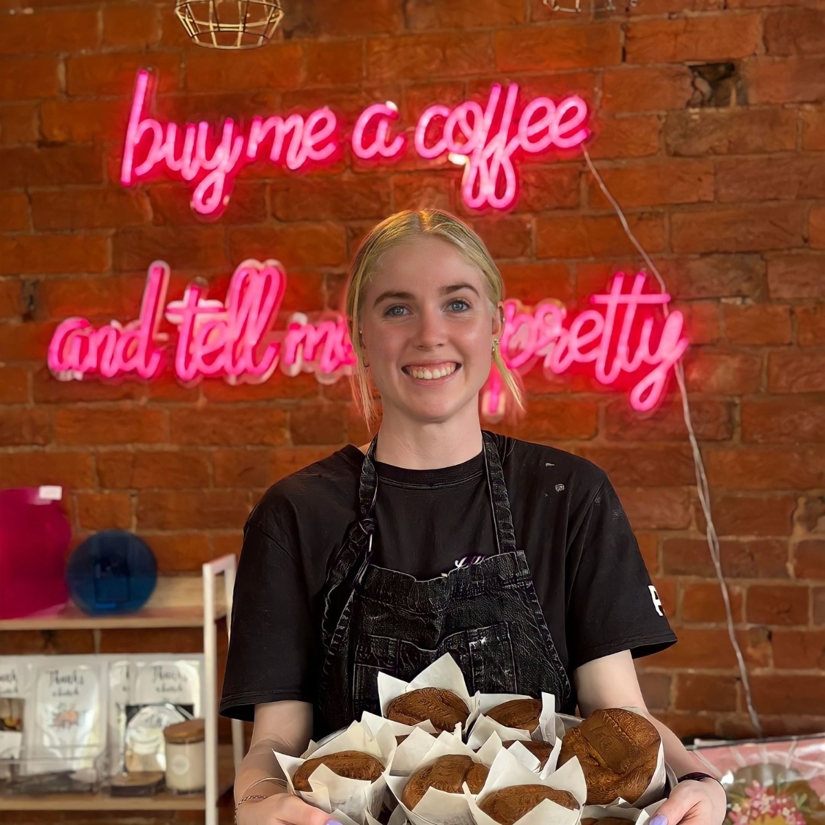 Buy me a coffee and tell me I'm pretty Custom Neon® selfie backdrop sign in pink on red brick wall @csc_dubbo